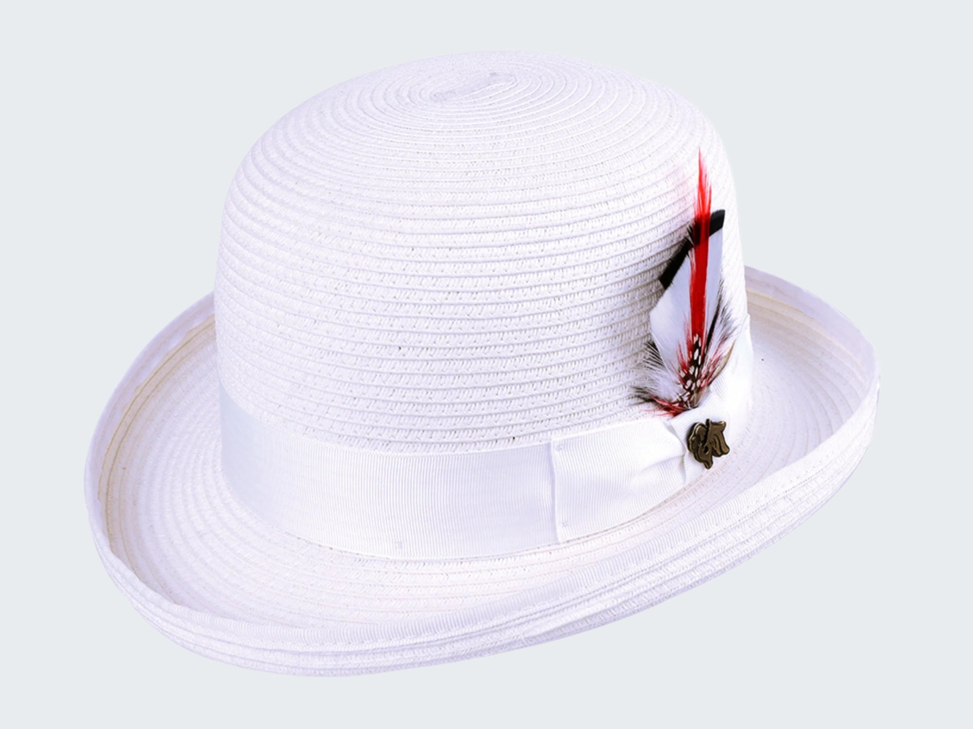 White straw hat with a feather on a white background