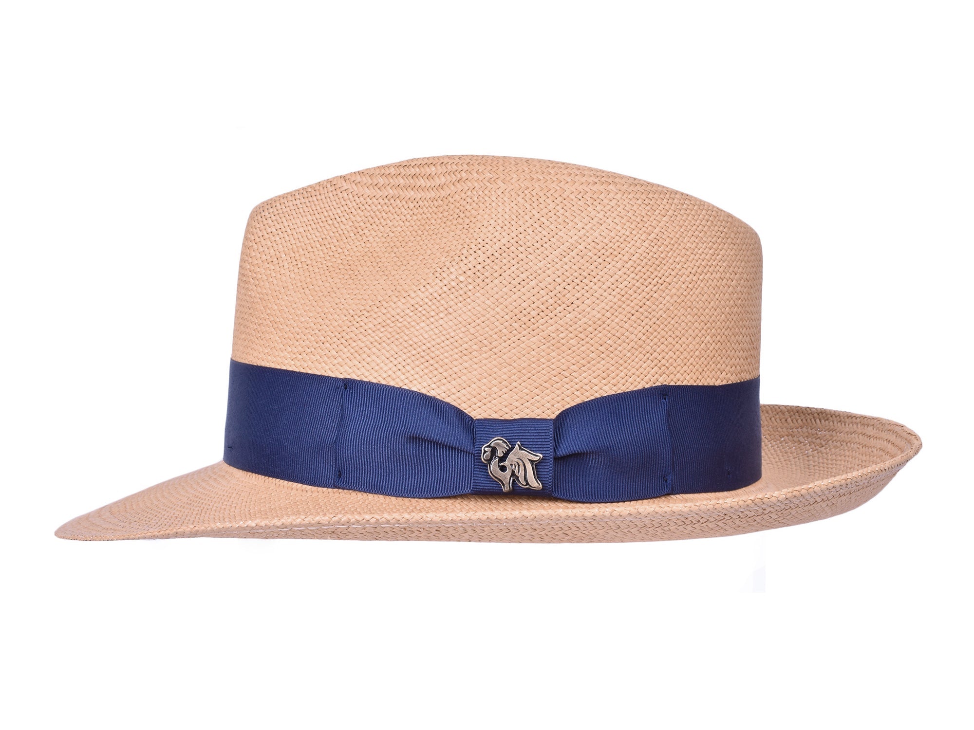 Beige straw hat with a blue ribbon and decorative emblem on a white background