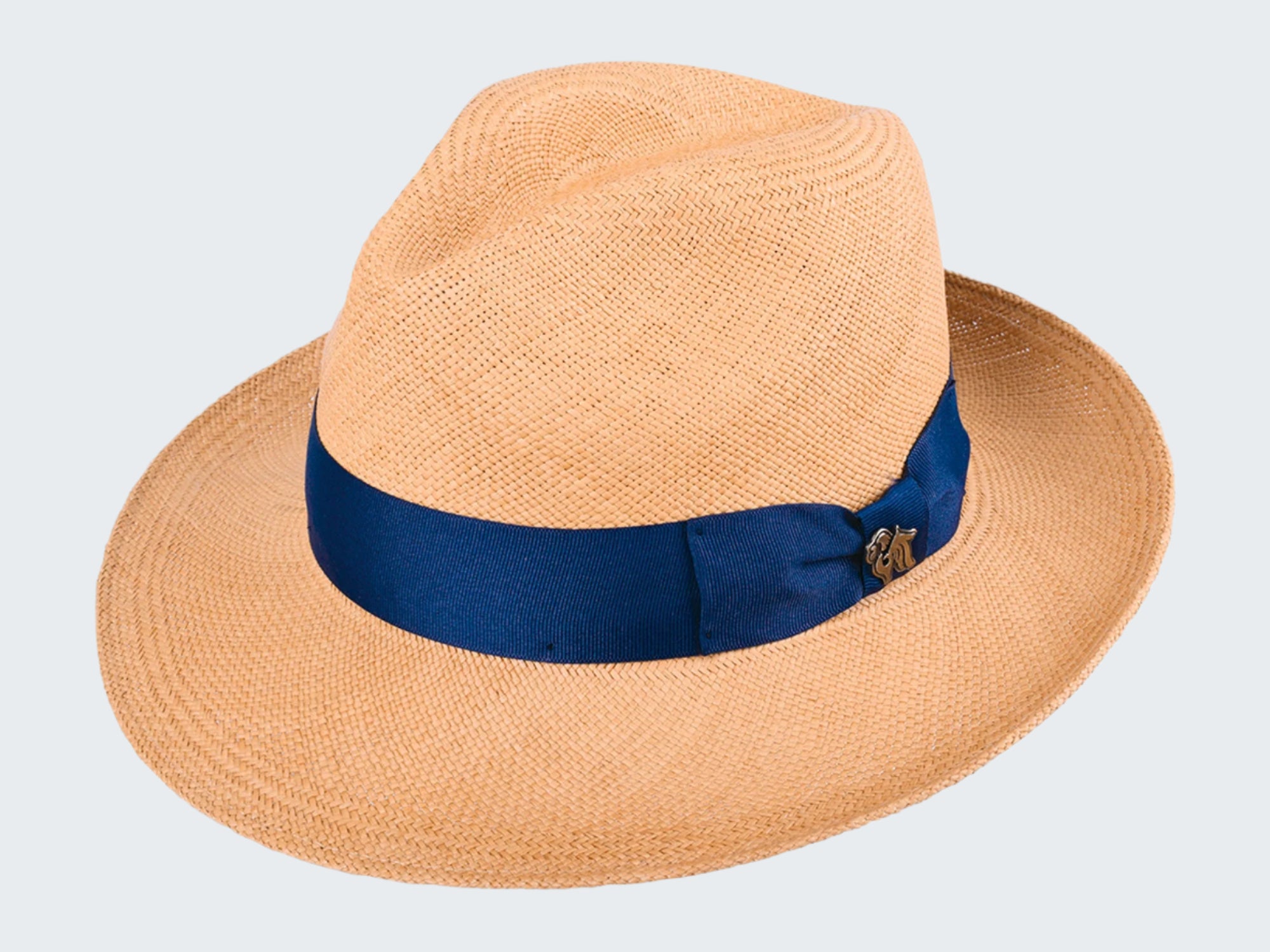 Beige straw hat with a blue band on a white background