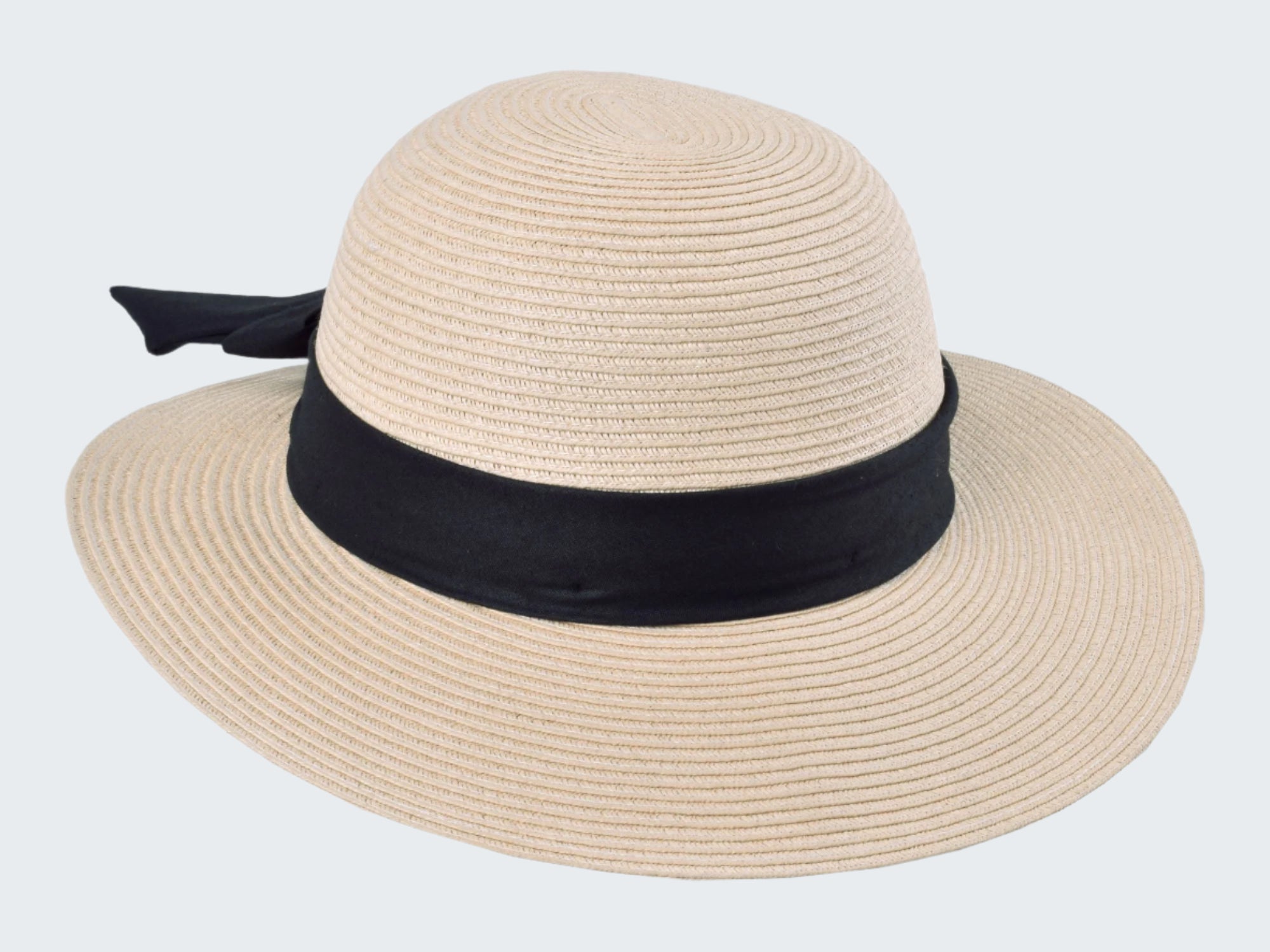 Beige straw hat with a black ribbon on a white background