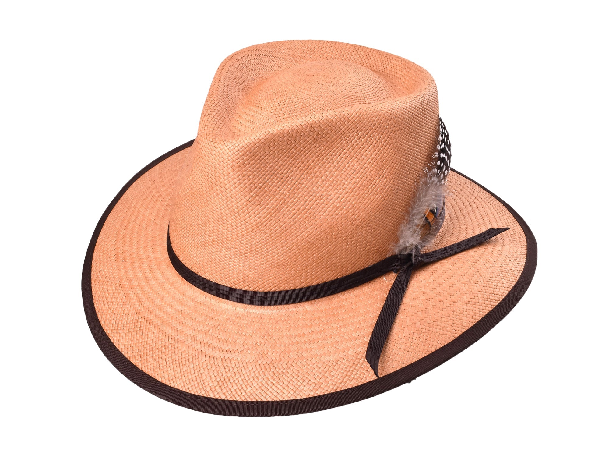 Beige straw hat with a black band and feather on a white background