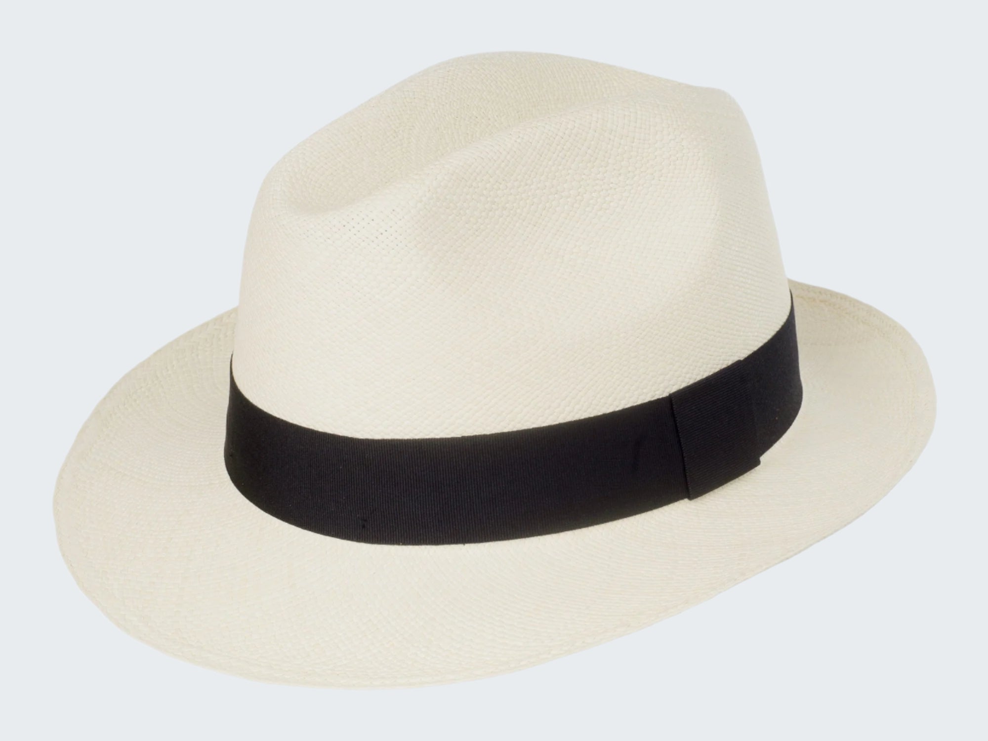 White fedora hat with a black band on a white background