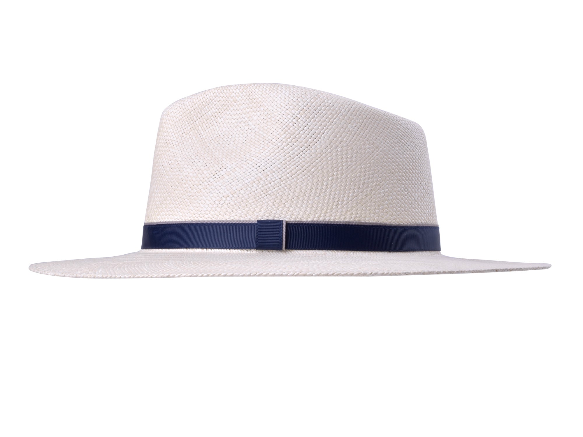 White straw hat with a navy band on a white background