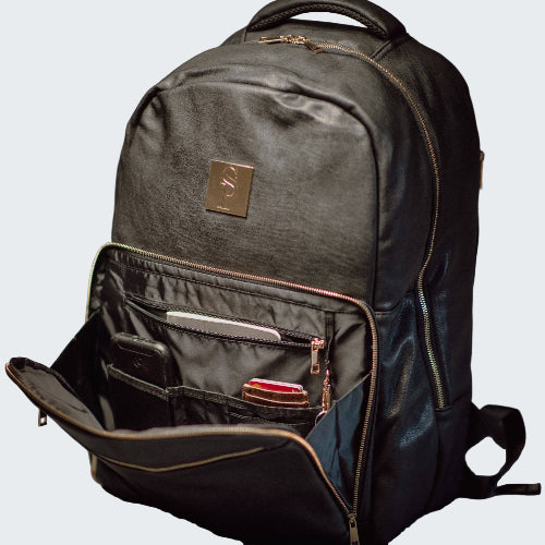 Gray backpack with open front pocket on a gray background