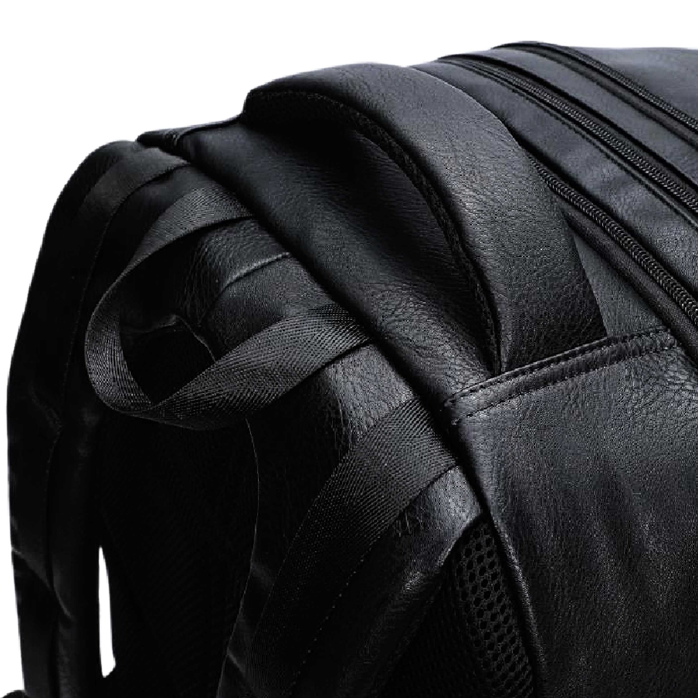 Close-up of a black leather backpack with visible stitching details.