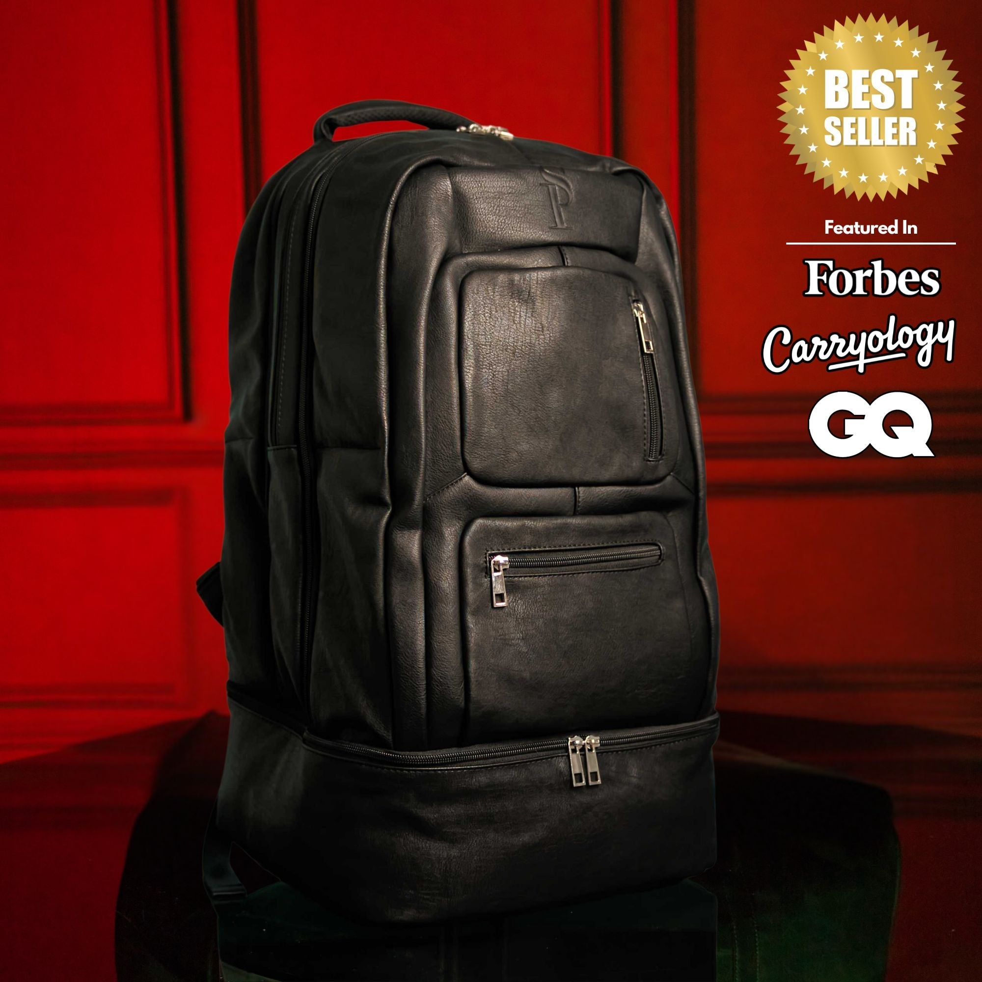 Black backpack on a red background with 'Forbes', 'Carryology', and 'GQ' logos.