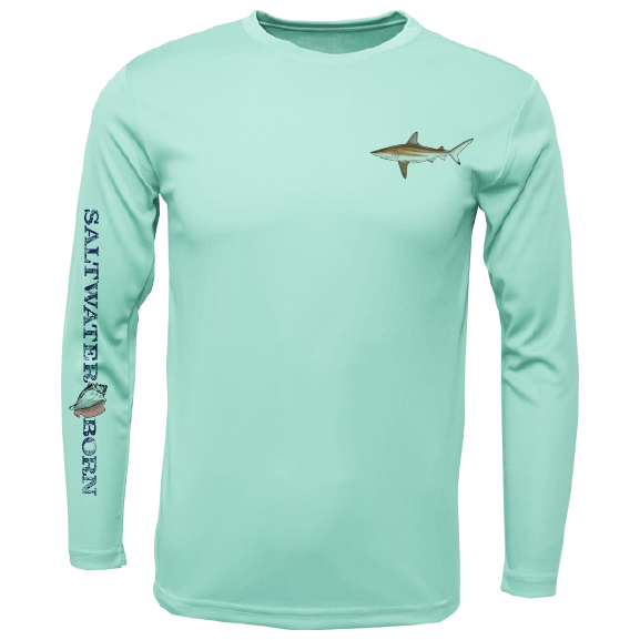 Mint green long-sleeve shirt with shark graphics and 'Saltwater Born' text on a white background
