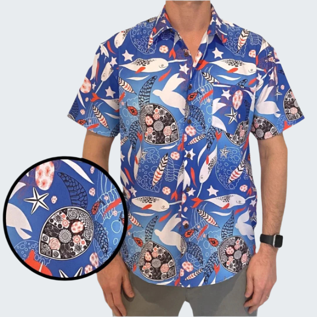 Man wearing a colorful patterned shirt with close-up detail on a white background