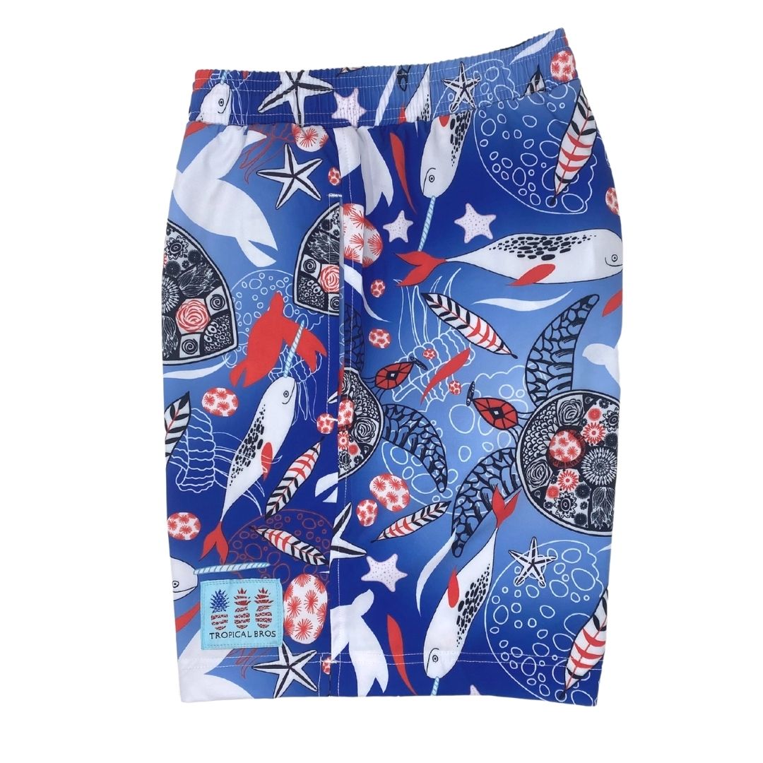 Blue shorts with a colorful sea-themed pattern on a white background