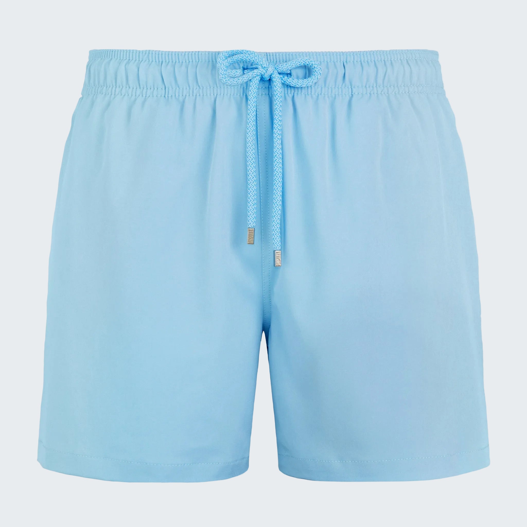 Light blue shorts with drawstring on a white background