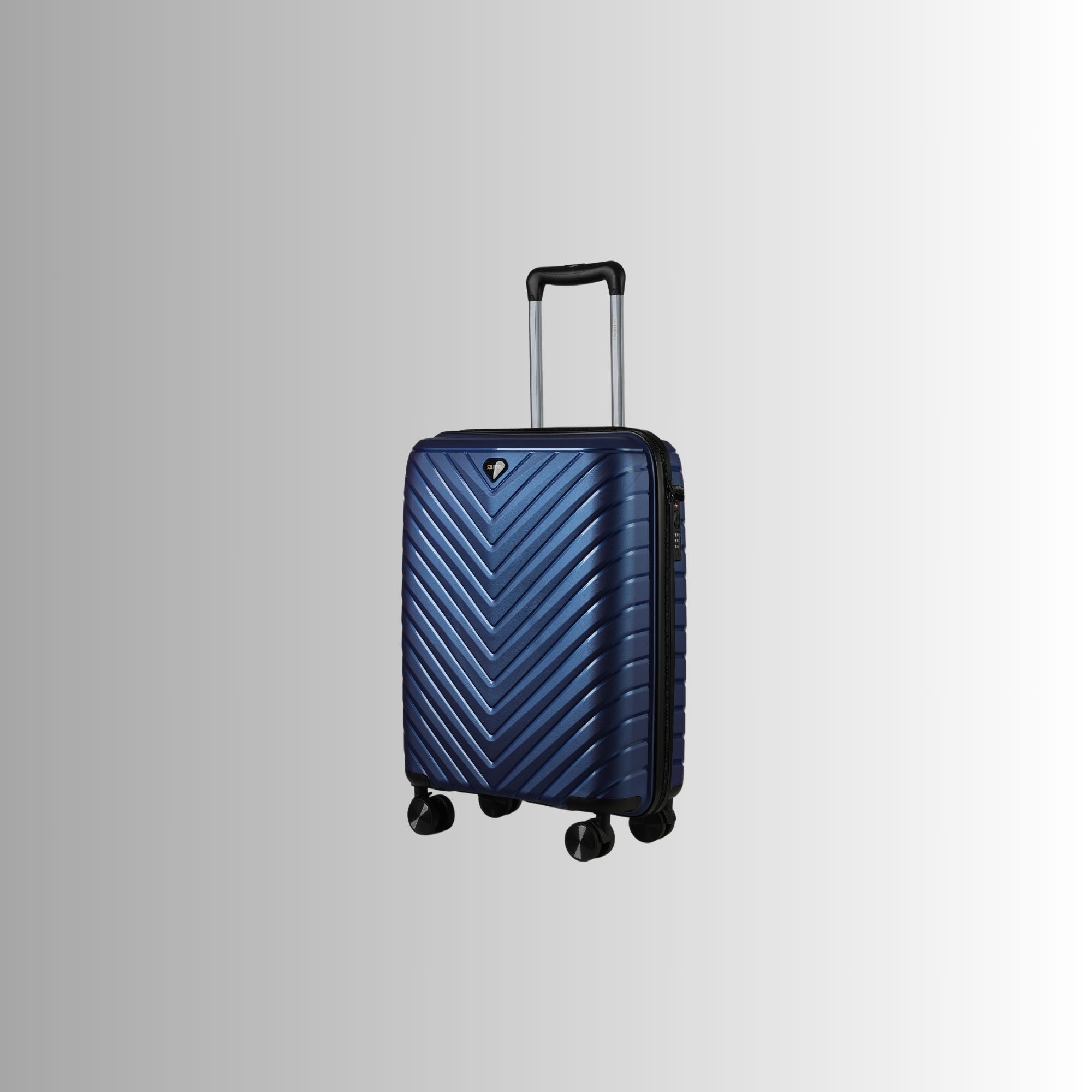 Blue suitcase with a chevron pattern on a light gray background
