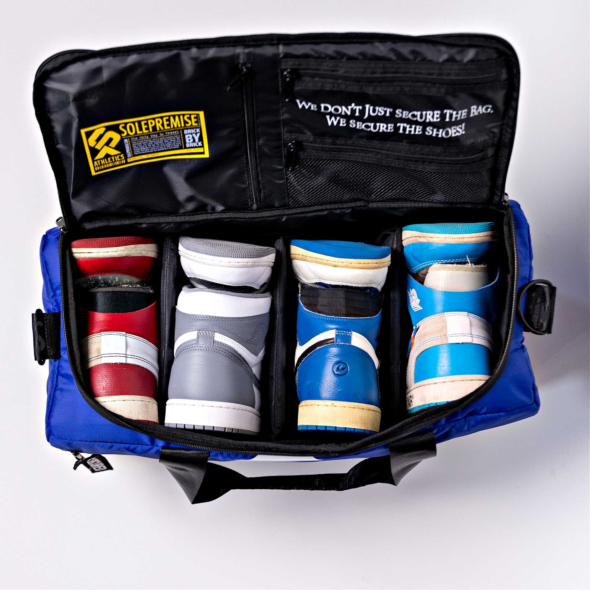 Blue shoe bag with various shoes inside, featuring Solepremise branding.