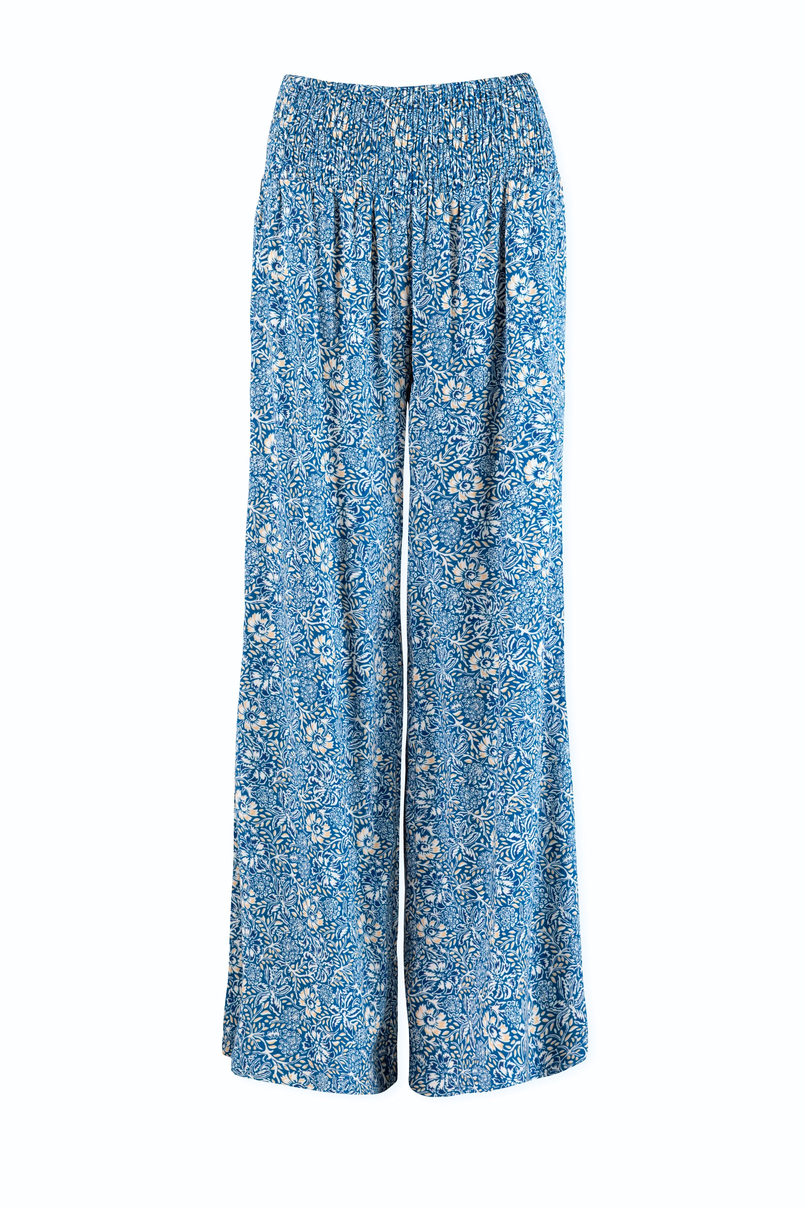 Blue floral-patterned pants on a white background