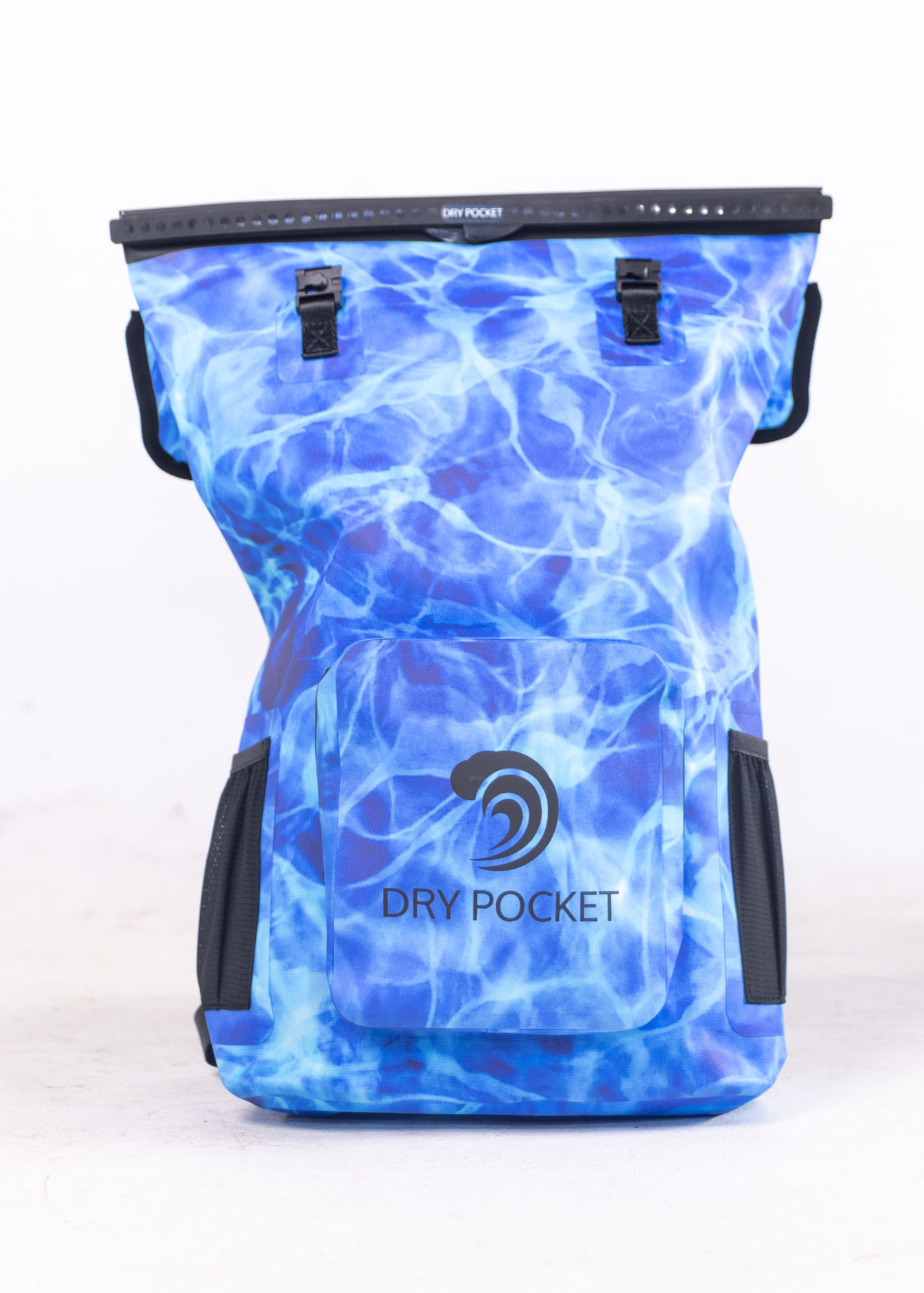 Blue water-patterned backpack with 'Dry Pocket' branding on a white background