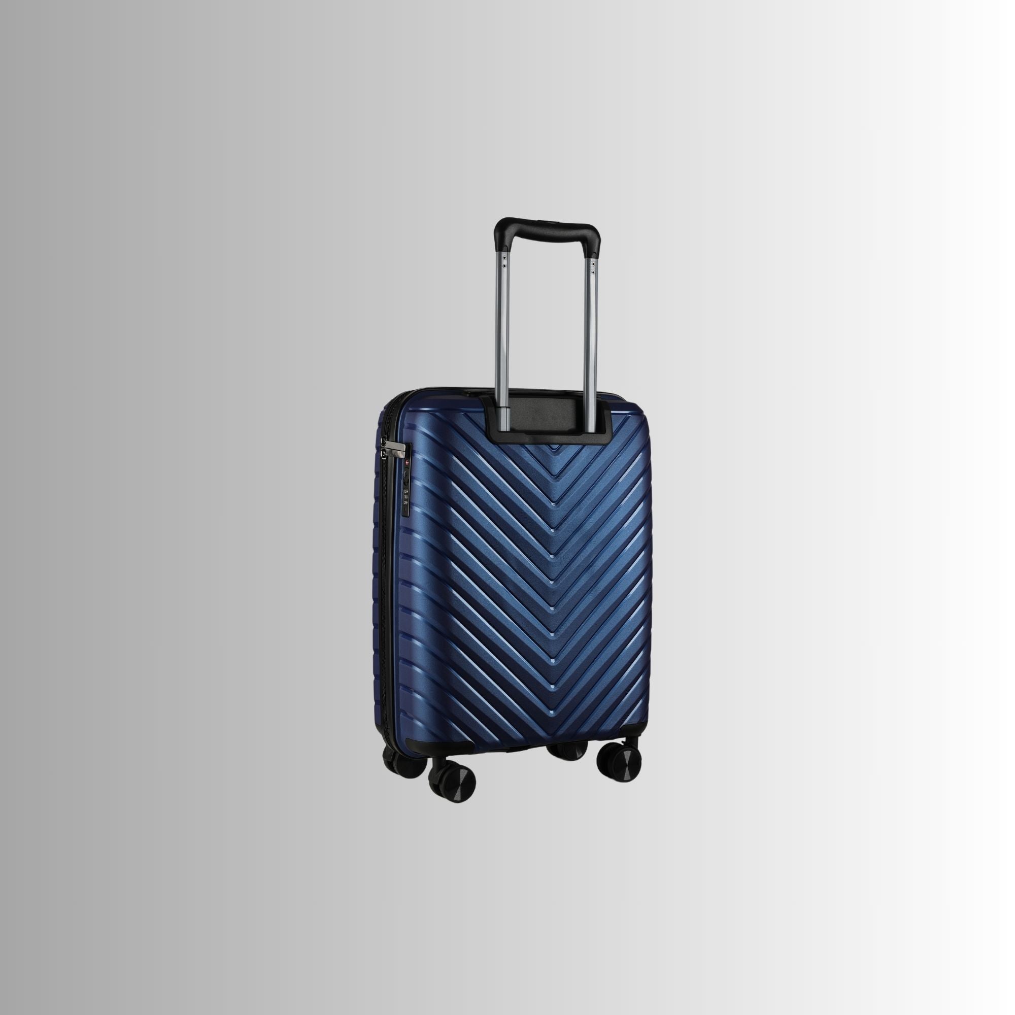 Blue suitcase with a chevron pattern on a light gray background