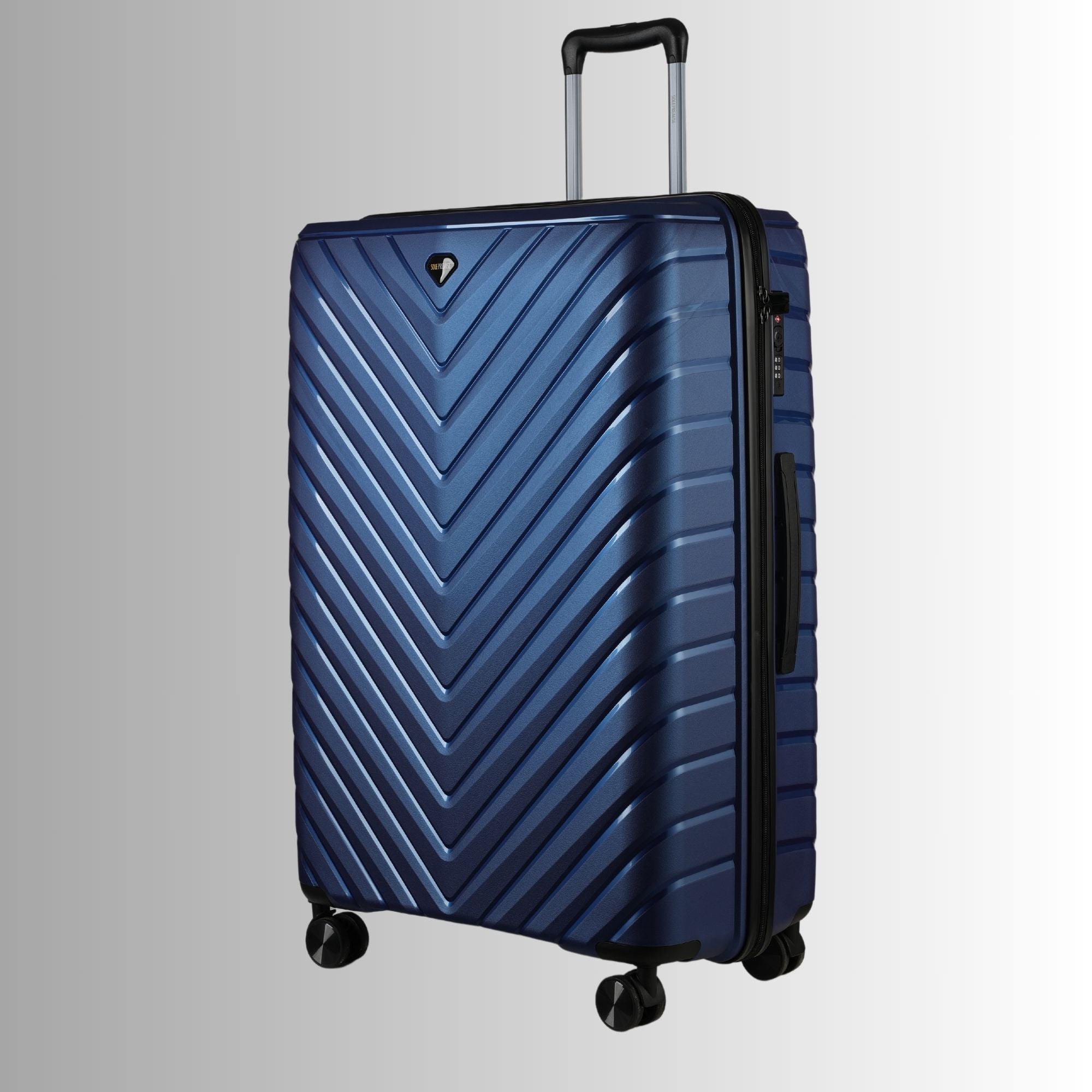Blue suitcase with a chevron pattern on a light gray background