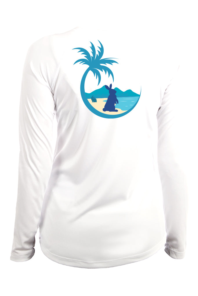 White long-sleeve shirt with a blue graphic of a palm tree and person on a beach.