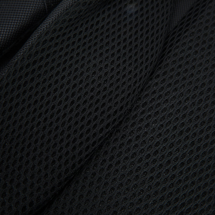 Close-up of black textured fabric with a grid pattern
