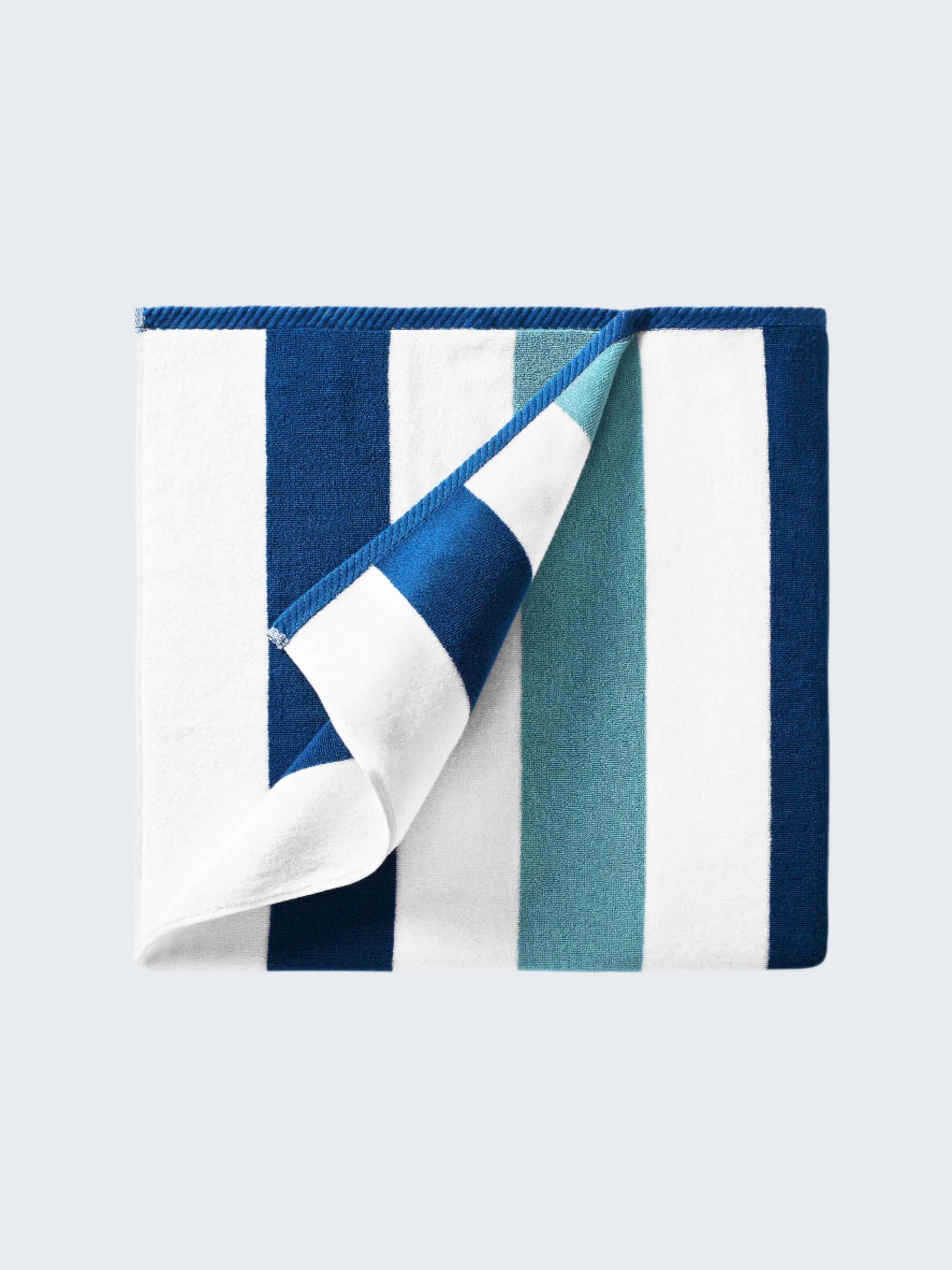 Striped fabric with blue, white, and teal colors on a white background