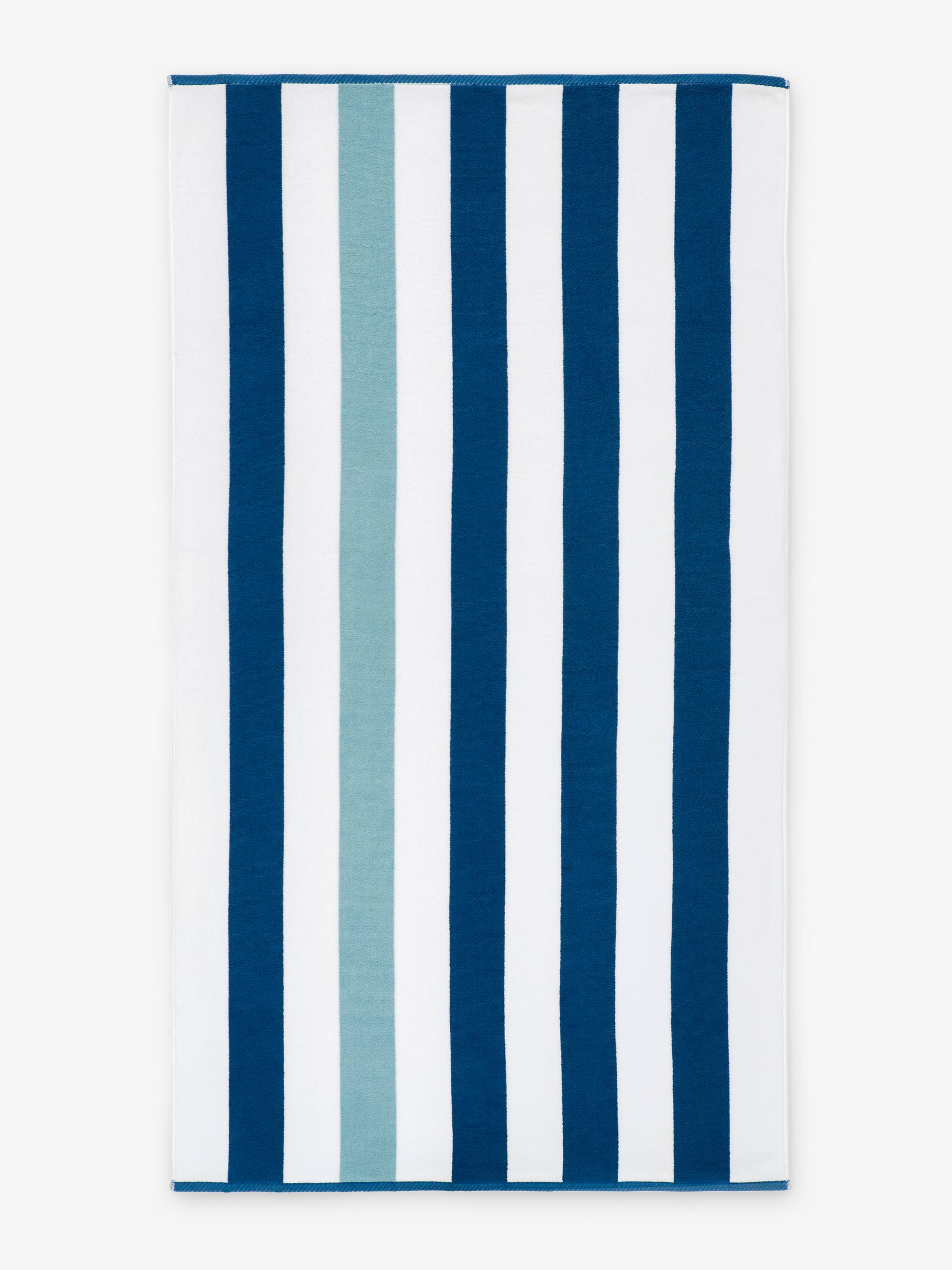 Striped towel with blue and white vertical stripes on a white background