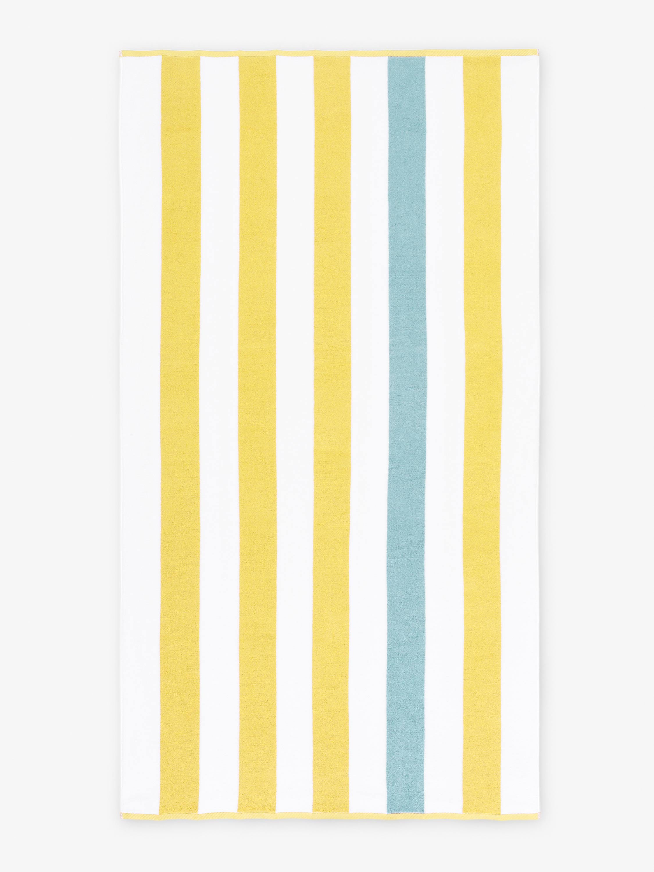 Towel with vertical stripes in yellow, white, and blue on a white background