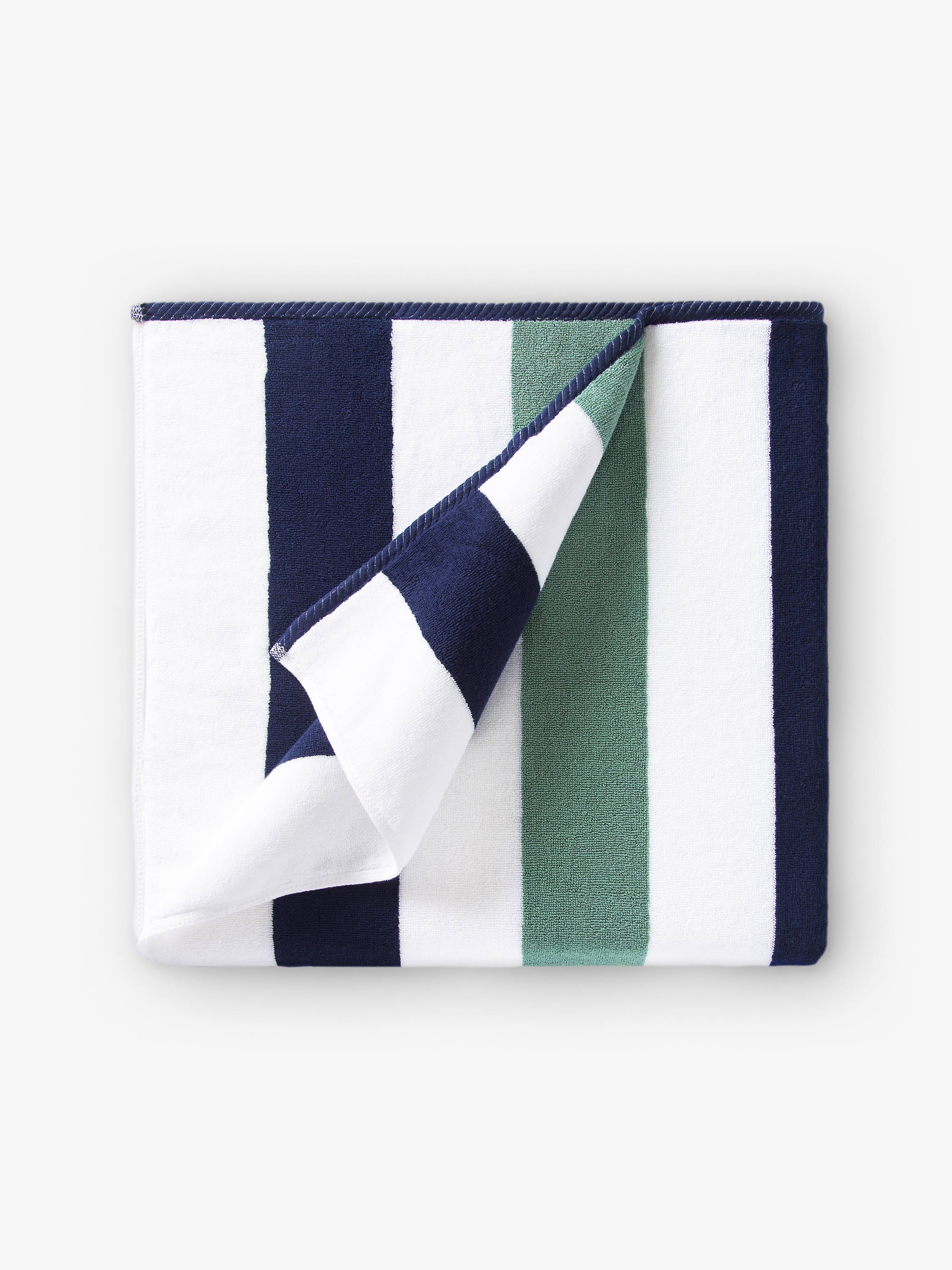 Striped fabric with blue, green, and white colors on a white background