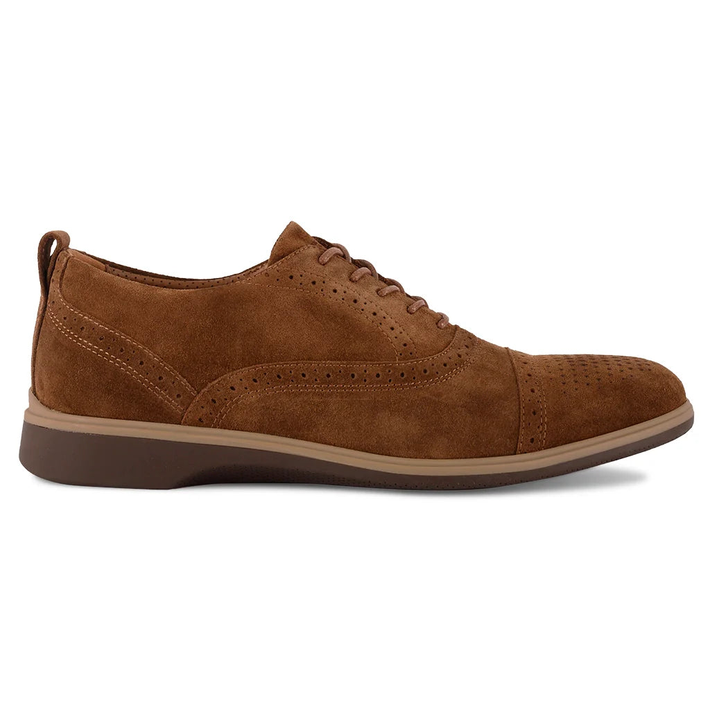 Brown suede shoe on a white background