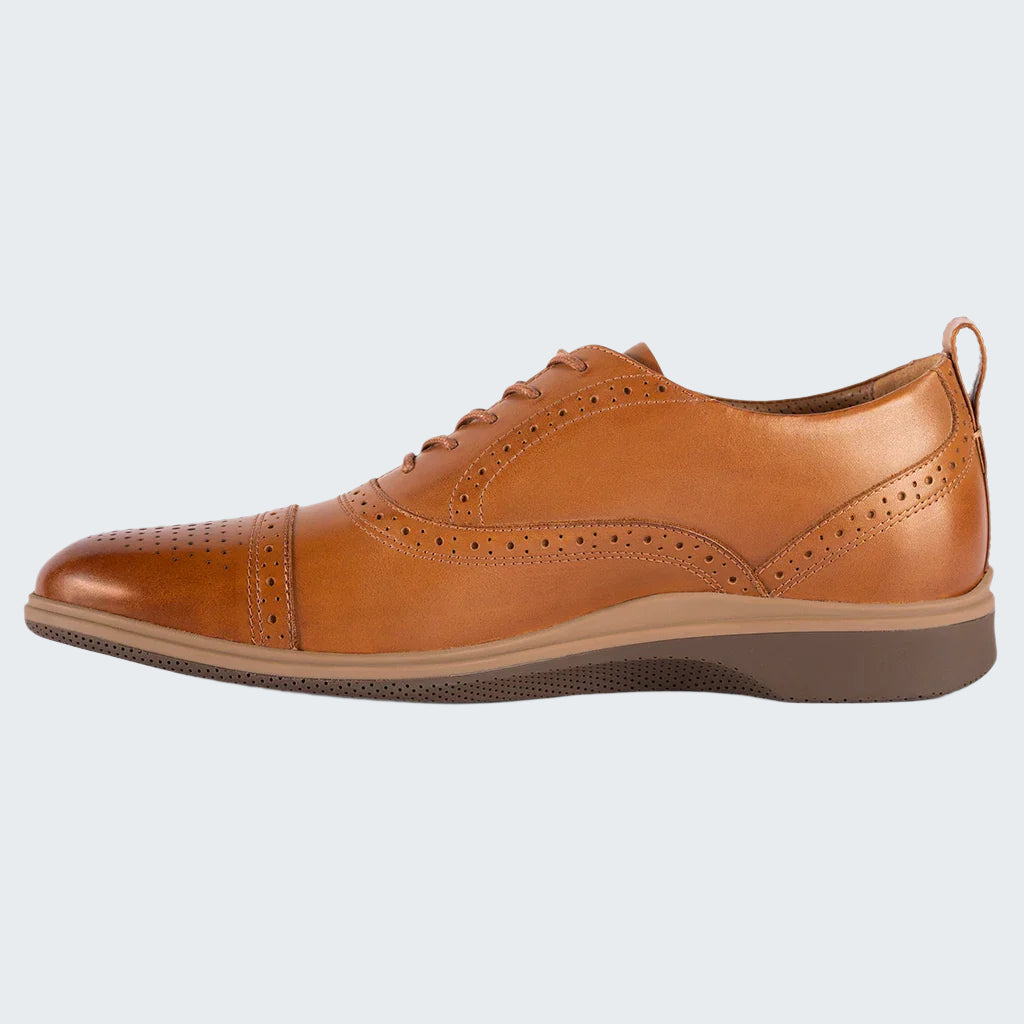 Brown leather shoe on a white background