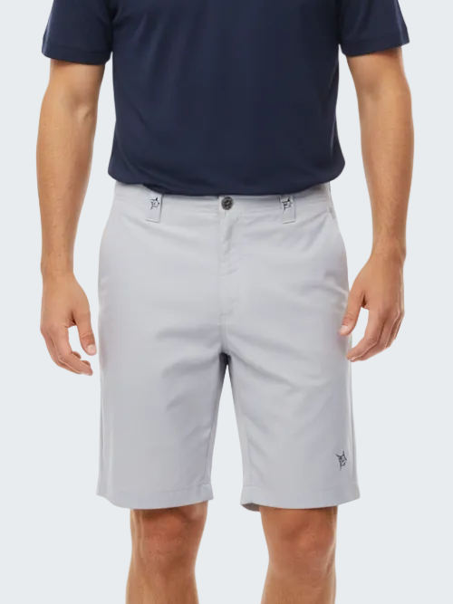 Person wearing light gray shorts and a navy blue shirt on a white background