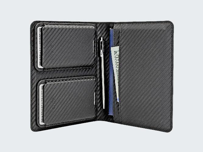 Carbon fiber wallet with card slots and bill holder on a light gray background