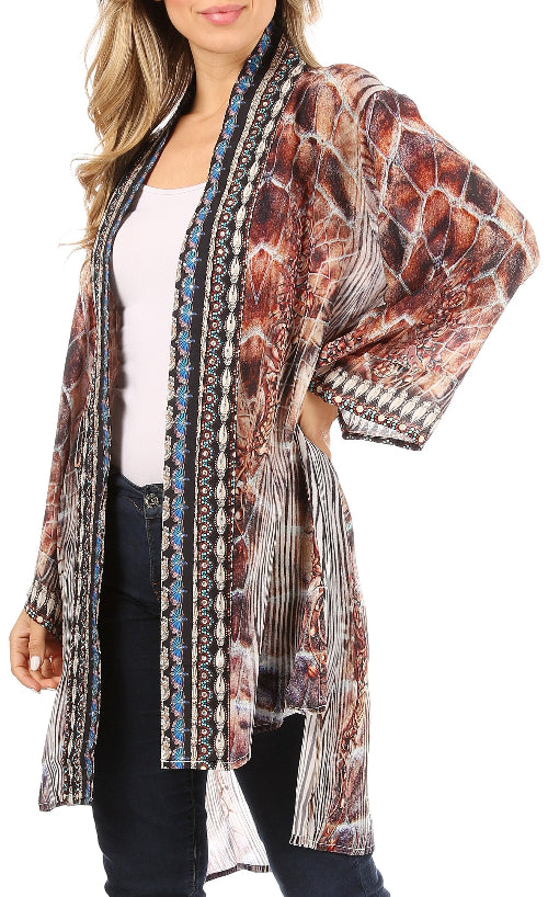 Woman wearing a patterned kimono-style jacket on a white background