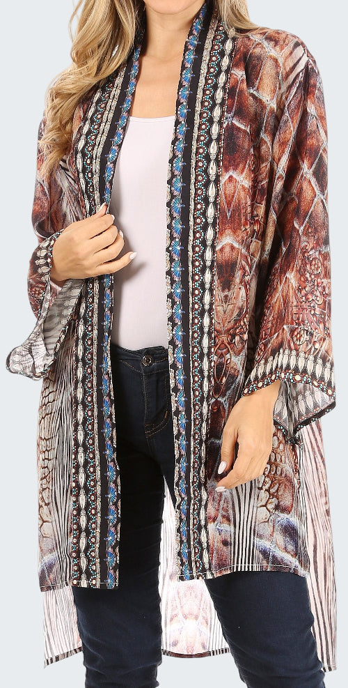 Long, patterned cardigan worn by a person on a white background