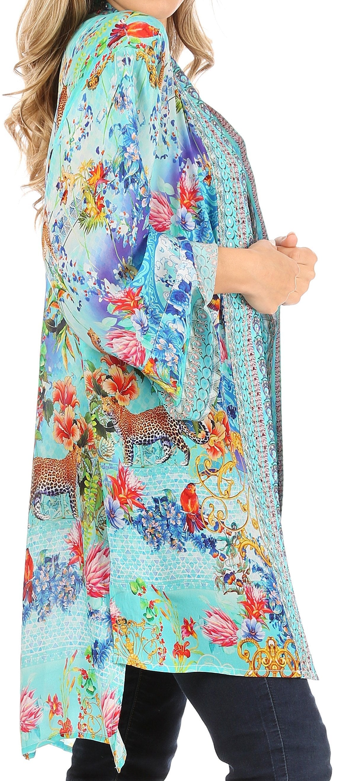 Woman wearing a colorful floral kimono-style garment.