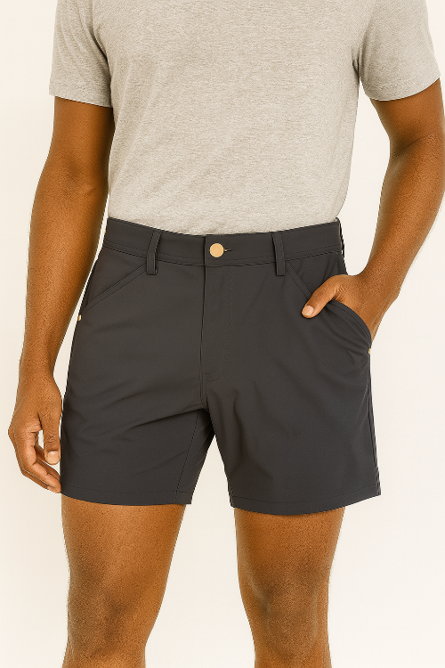 Person wearing black shorts and a gray t-shirt on a white background