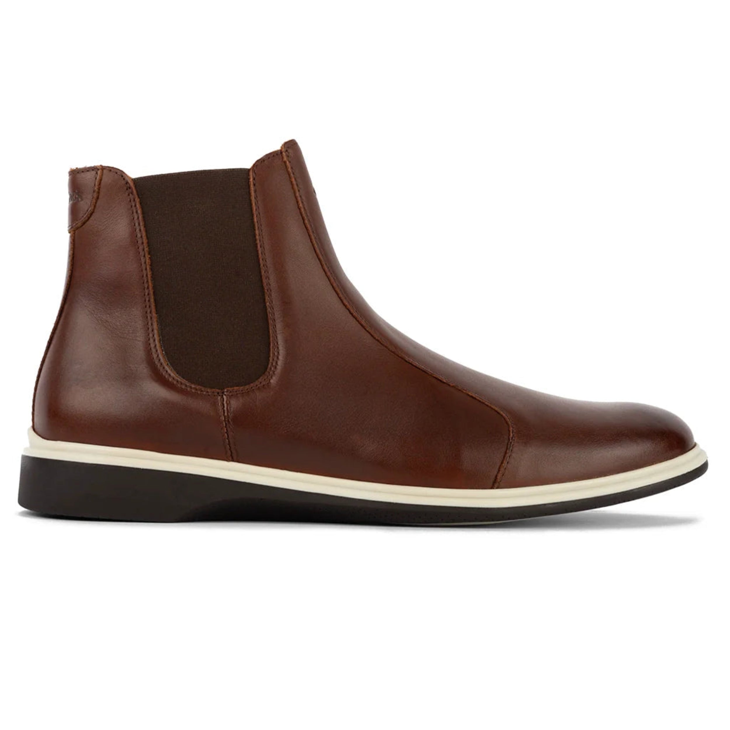 Brown leather Chelsea boot with a white sole on a white background