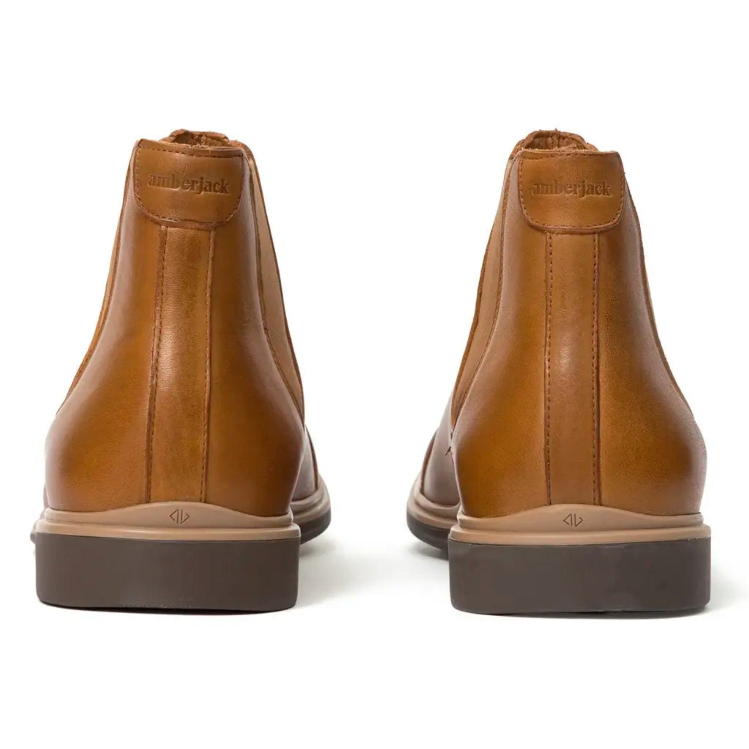 Pair of brown leather boots on a white background