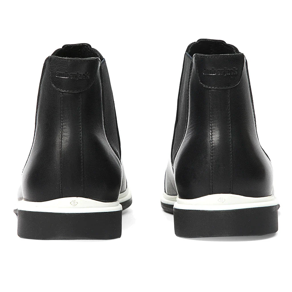 Black leather high-top sneakers with white soles on a white background