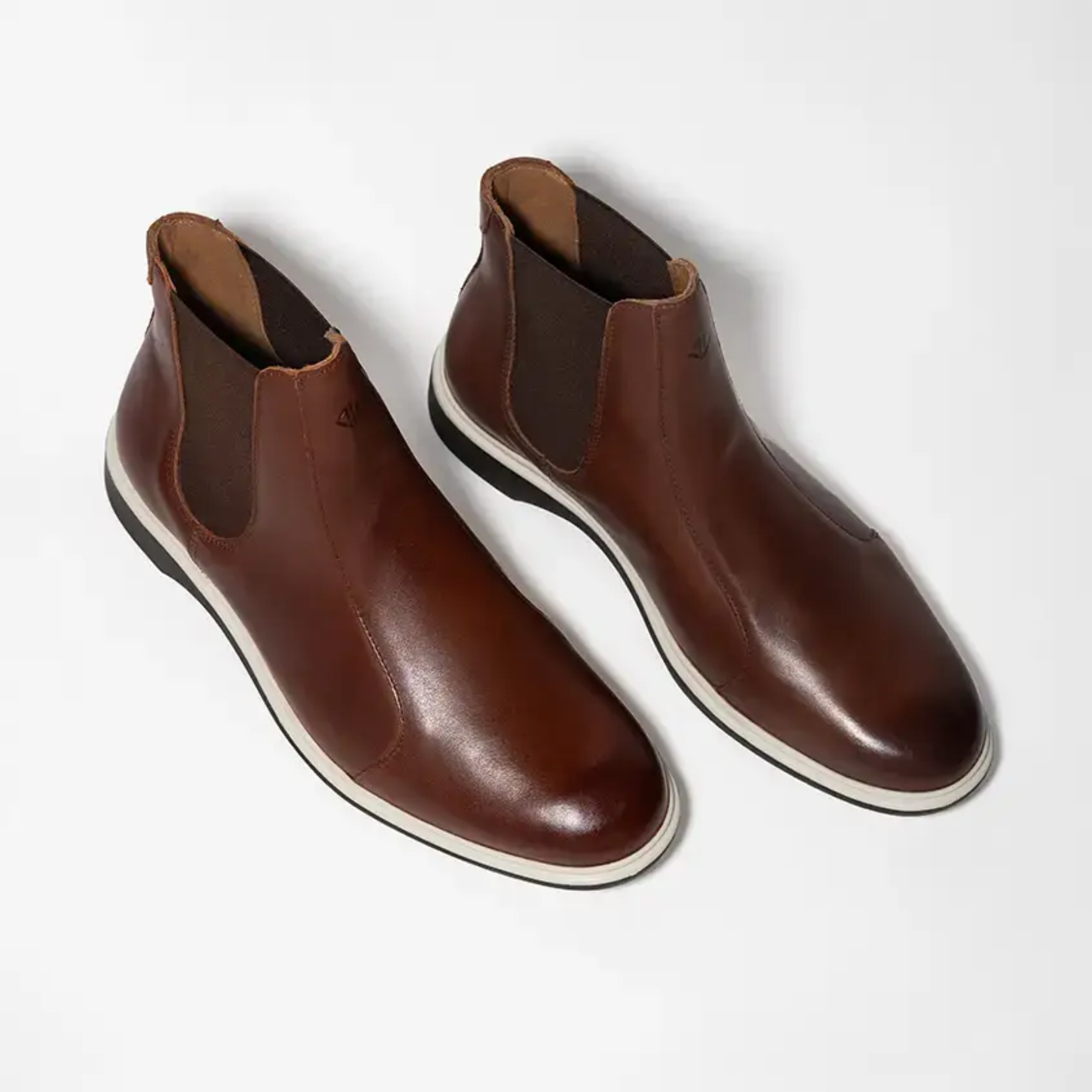 Pair of brown leather shoes on a white background