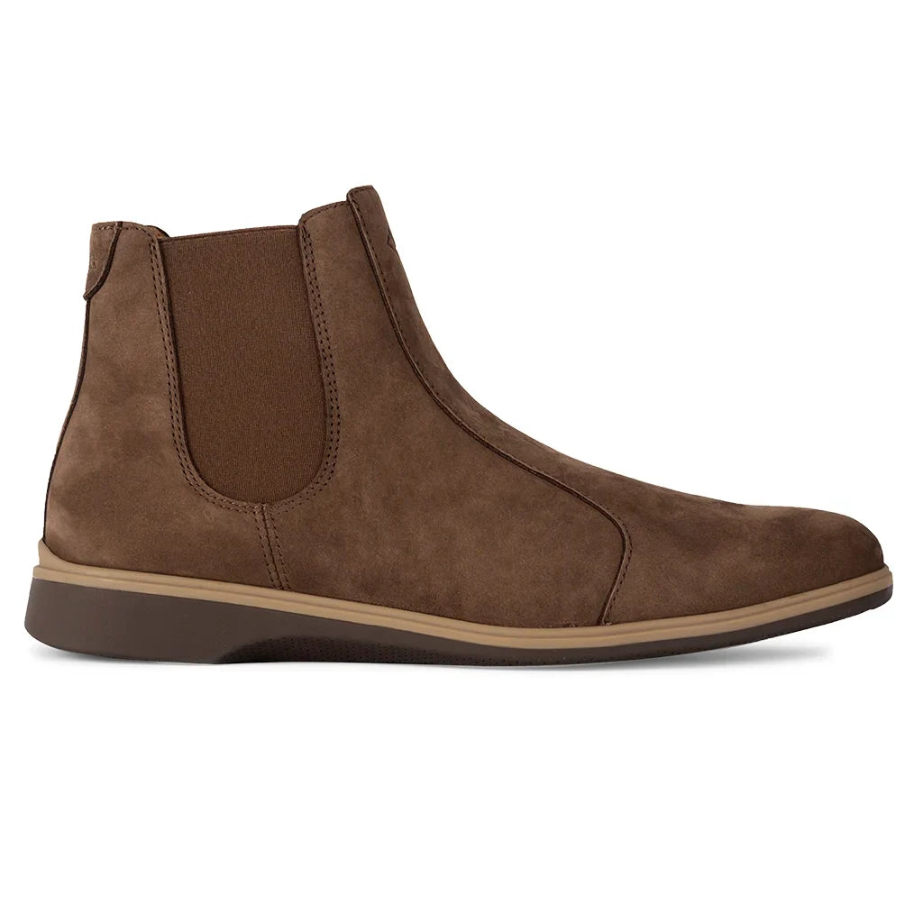 Brown suede Chelsea boot on a white background