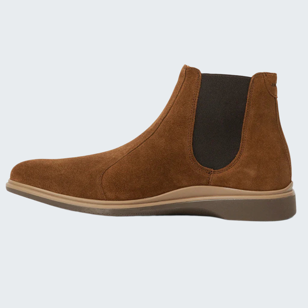 Brown suede Chelsea boot on a white background