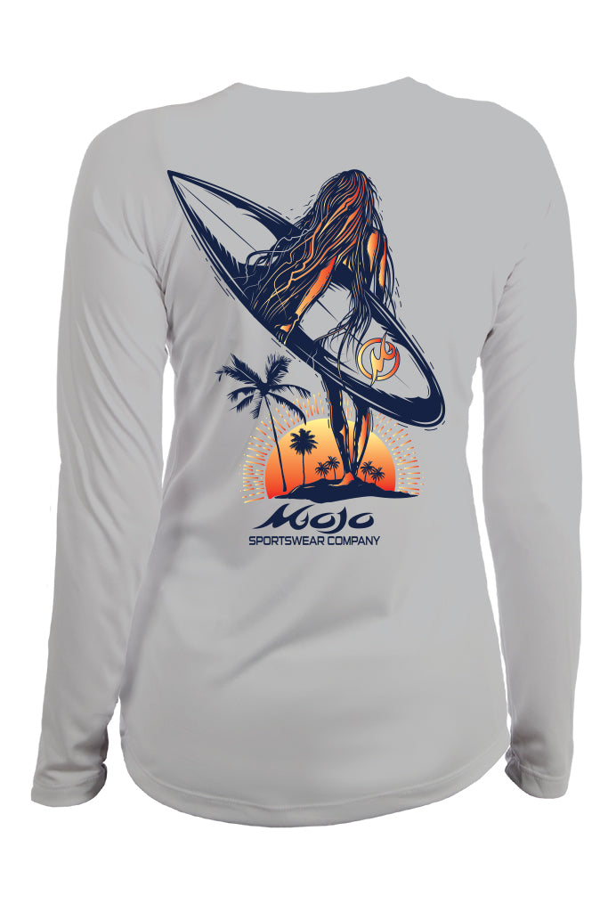 Gray long-sleeve shirt with a graphic of a woman on a surfboard, palm trees, and sunset, featuring the Moja Sportswear Company logo.