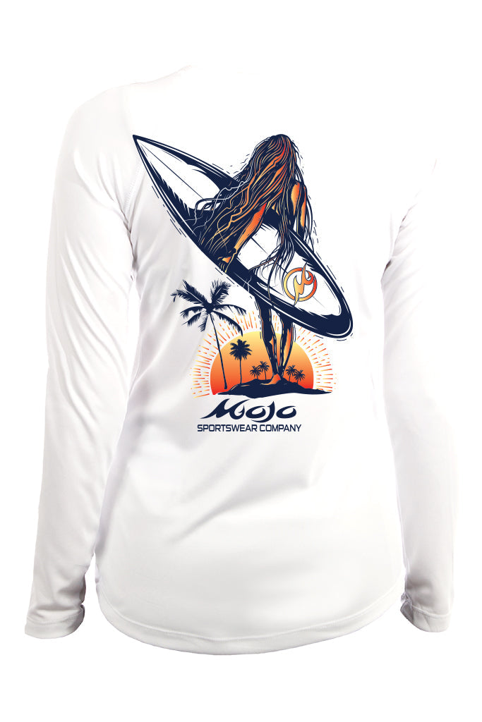 White long-sleeve shirt with a graphic of a woman on a surfboard, palm trees, and sunset, featuring the Mojo Sportswear Company logo.