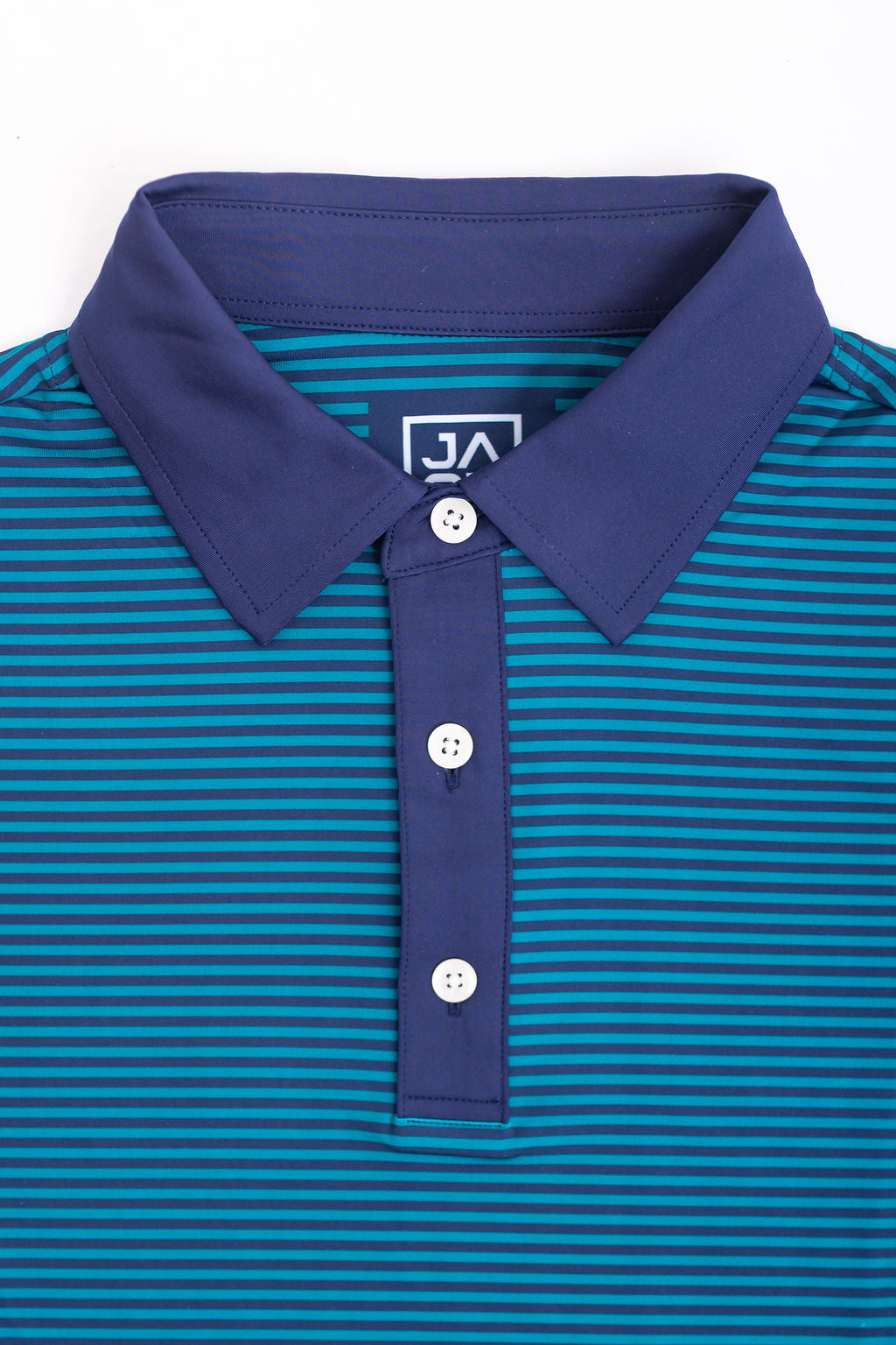 Blue and green striped polo shirt with a collar and buttons on a white background