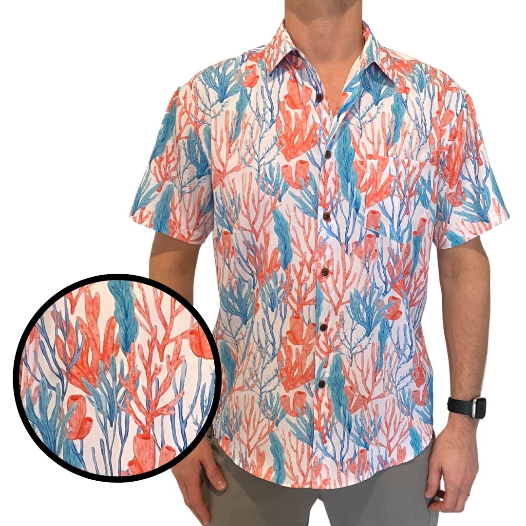 Man wearing a colorful floral shirt with a close-up of the pattern on a white background