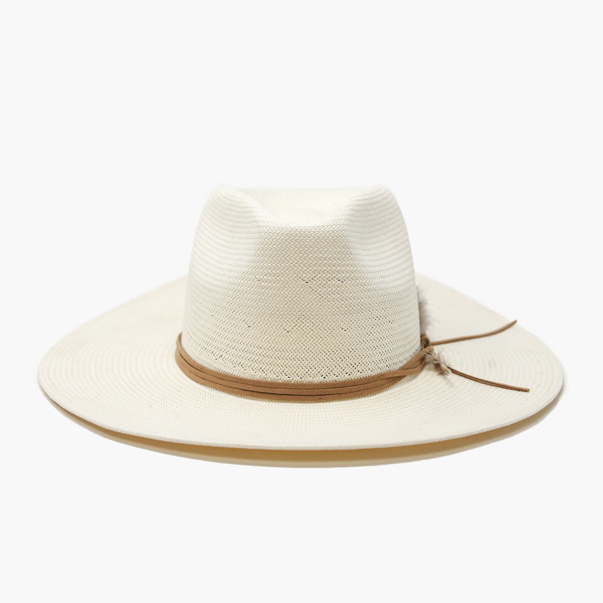White straw hat with a brown band on a white background
