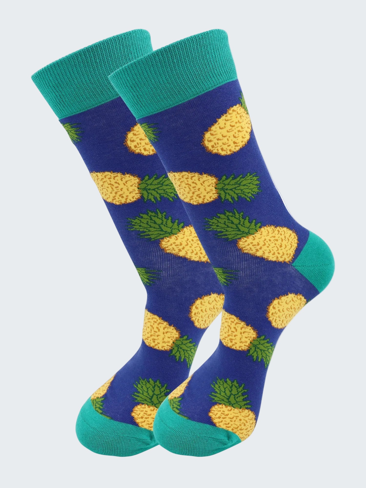 Pair of socks with pineapple pattern on a white background