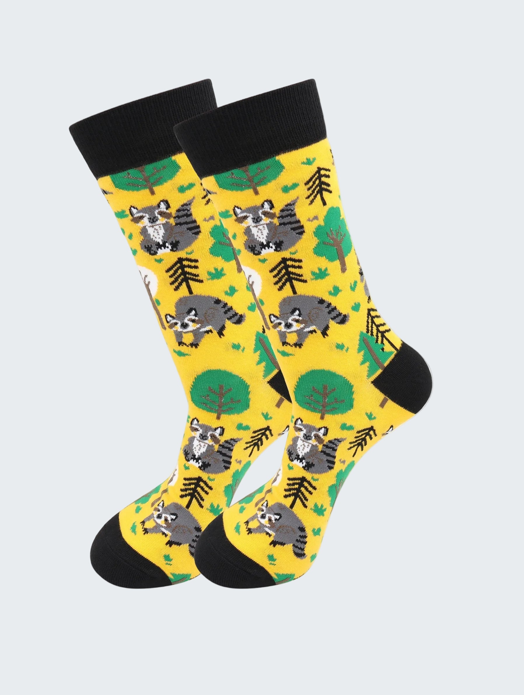 Yellow socks with raccoon pattern on a white background