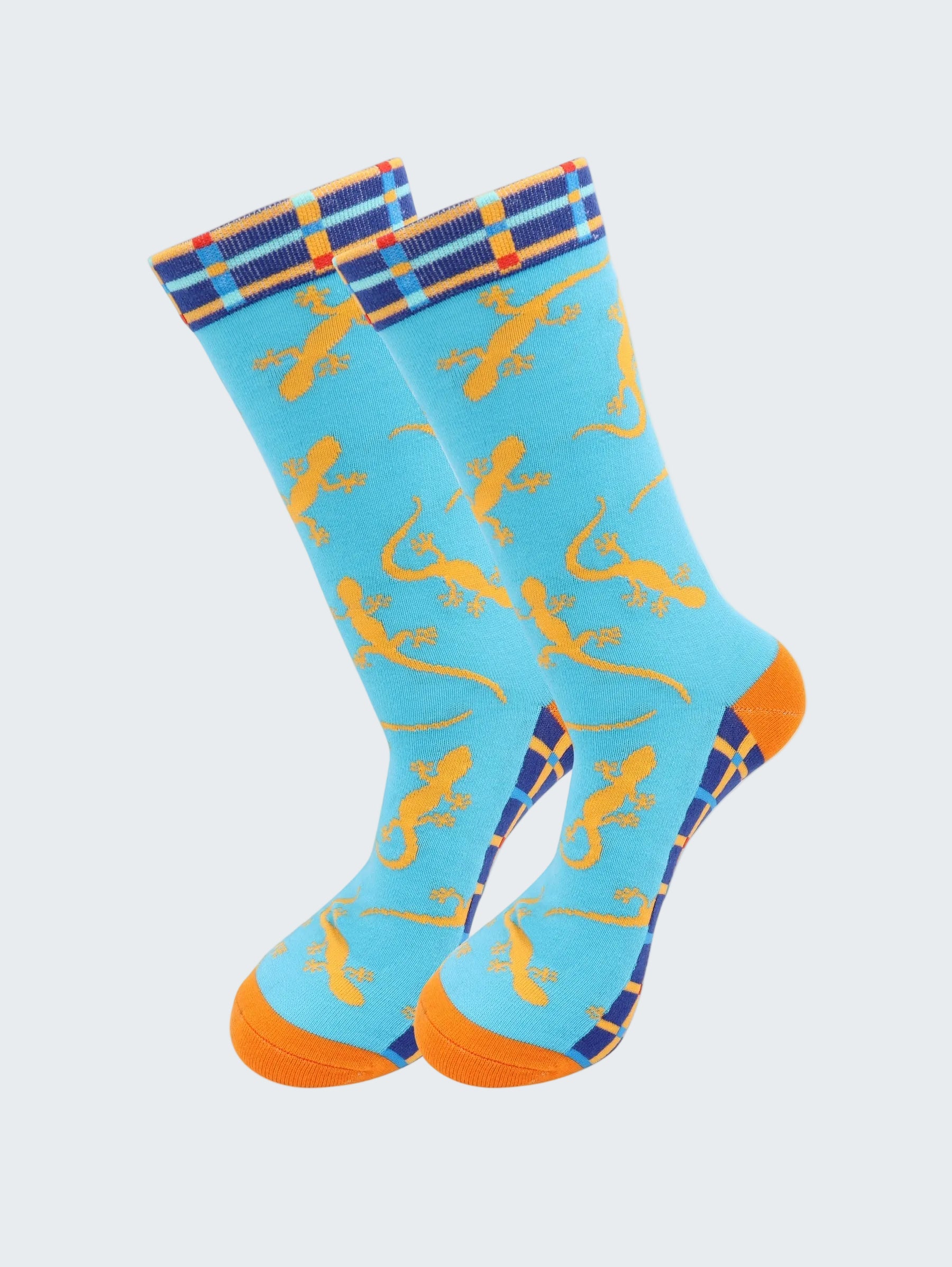 Blue socks with yellow lizard pattern and orange toes on a white background