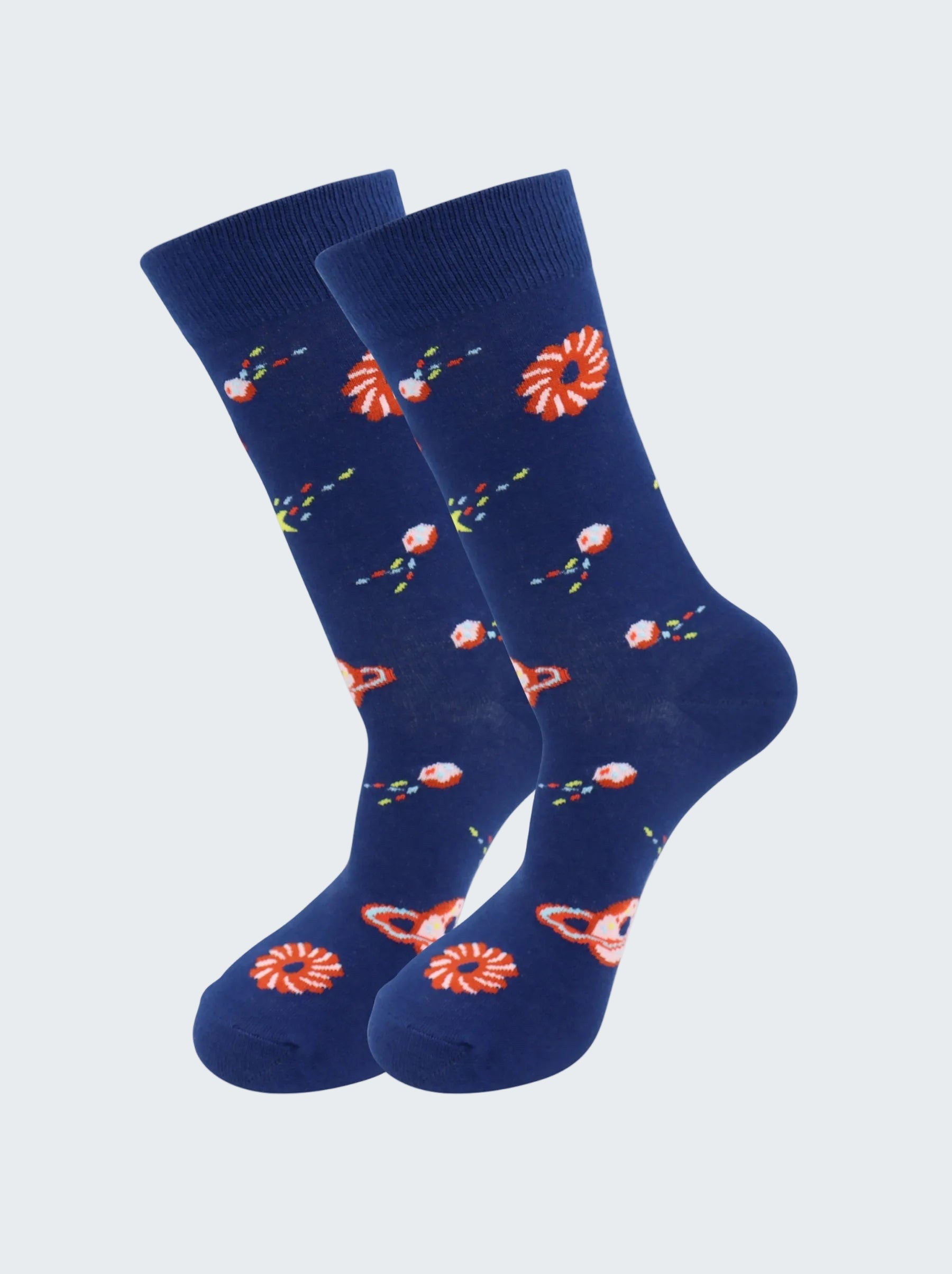 Pair of blue socks with red and white floral patterns on a white background