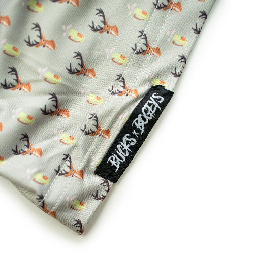 Fabric with deer antler pattern and 'Bucks N' Bows' label on a white background